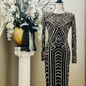 Ready to step out in style?This preloved Gianni Bini is perfect for your event!